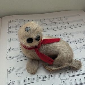 Adorable Seal Figurine with Red Scarf